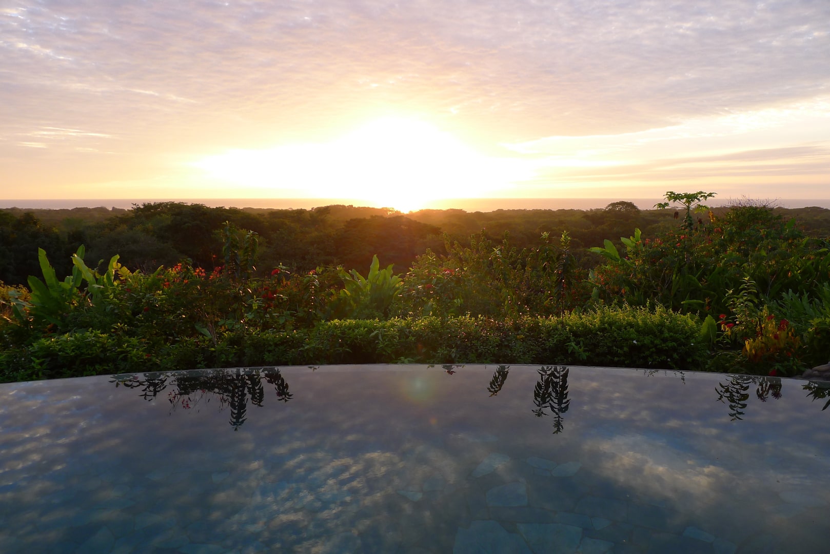 Casa Shambala Avellanas Costa Rica vacation rental sunset over pool-min
